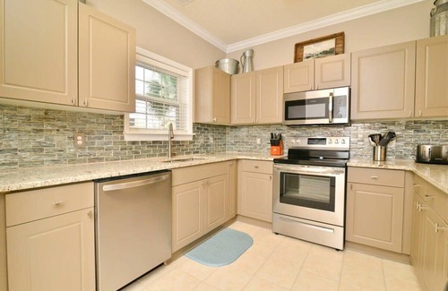 North Myrtle Beach Condo | Lakefront Luxury 15000sf Pool in Amazing Location