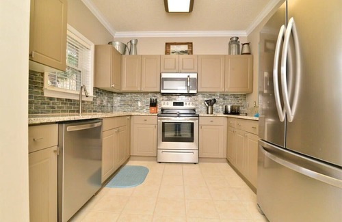 North Myrtle Beach Condo | Lakefront Luxury 15000sf Pool in Amazing Location