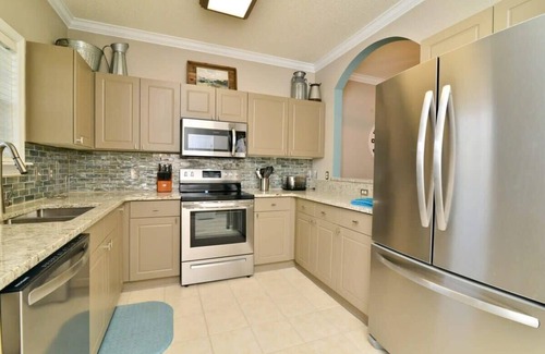 North Myrtle Beach Condo | Lakefront Luxury 15000sf Pool in Amazing Location