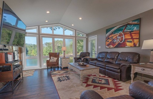 Goodview House | Lakefront Retreat w/ Game Room, Hot Tub, and Gym!