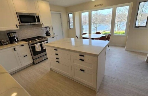Walton Park House | Lakefront retreat with stellar water views just a short drive from West.