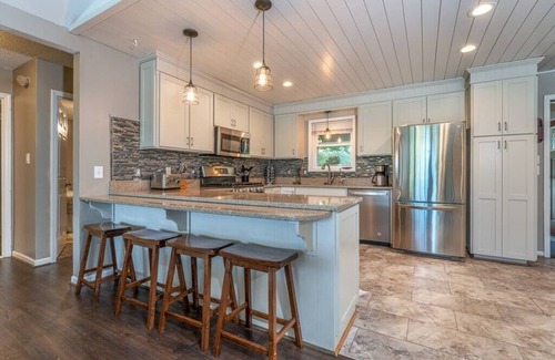 Goodview House | Lakefront Retreat with Game Room, Hot Tub, and Gym!