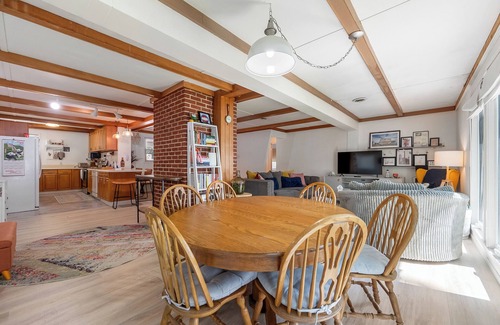 Ingles House | Lakefront retreat with private dock, open living, fire pit, full kitchen & cozy indoor spaces