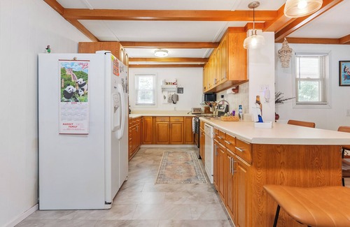 Ingles House | Lakefront retreat with private dock, open living, fire pit, full kitchen & cozy indoor spaces