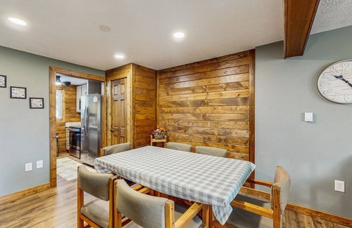 McHenry House | Lakefront townhouse near lake & skiing with hot tub & wood-burning fireplace