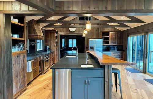 Naples House | Lakefront views fire place Private Beach