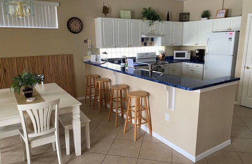 Sunset Lakes House | Lakefront Villa - Less than 10 mins to Disney!