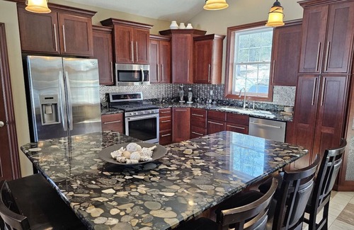 Wetmore House | Lakehouse near Pictured Rocks, Trails, Personal Bar, Game Room, & Hot Tub!