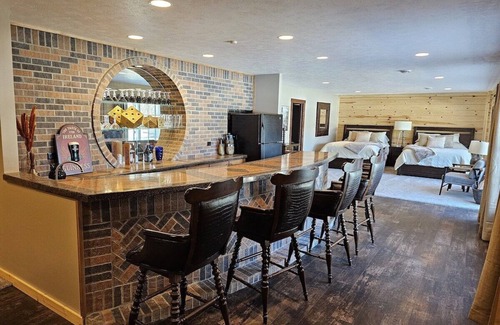 Wetmore House | Lakehouse near Pictured Rocks, Trails, Personal Bar, Game Room, & Hot Tub!