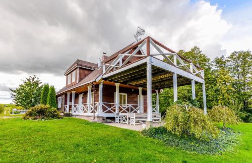 Dvarcenai House | Lakeshore house