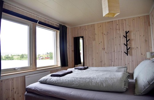Skaulo House | Lakeside cottage in Lapland with great view