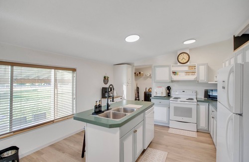 Pine Hollow House | Lakeside King Suite: Luxurious and Cozy with Stunning Golden Hour Views.