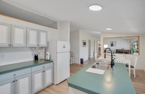 Pine Hollow House | Lakeside King Suite: Luxurious and Cozy with Stunning Golden Hour Views.