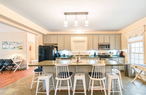 Orange House | Lakeside retreat with a firepit, dock, sprawling deck, pool table - dog friendly