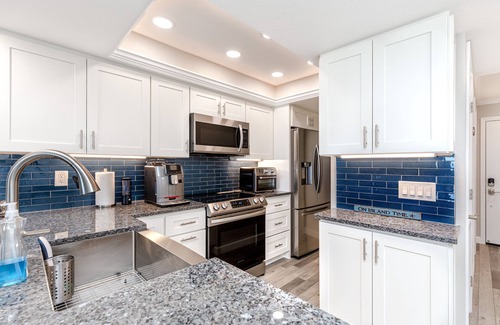 Sunset Beach Condo | Land's End 402 building 6 AMAZING Updates/Top floor with the BEST Beach View.