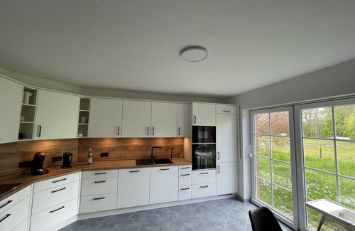 Loquard House | Landhaus Maarweg, large for 10 people, modern furnishings, fireplace, garden