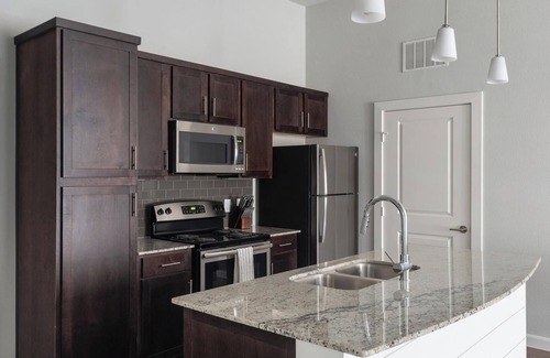 Buda Apartment | Landing | Modern 1BD, Yoga Studio, Gym