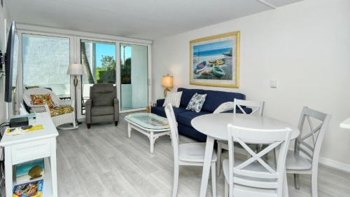 Longboat Key Apartment | LaPlaya 104E Perfectly located near the path to the beach just steps from the pool