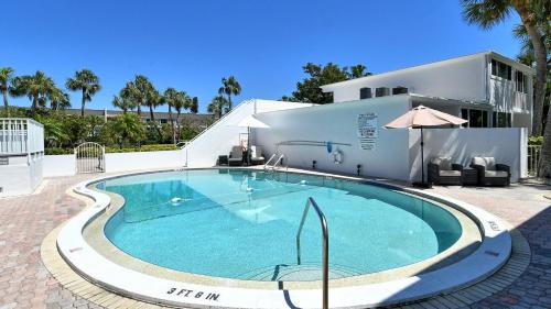 Longboat Key Apartment | LaPlaya 108B Dream views of the Gulf from your private balcony or screened lanai just steps from the beach