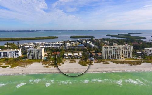 Longboat Key Apartment | LaPlaya 201C Breathtaking Gulf panorama from this corner end unit with a private stairway to the beach