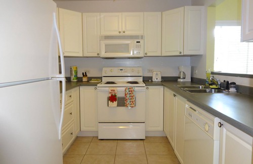 Bodden Town Condo | Large 2 bedroom & 2 bathroom condo with sea view terrace, 1 min walk to beach