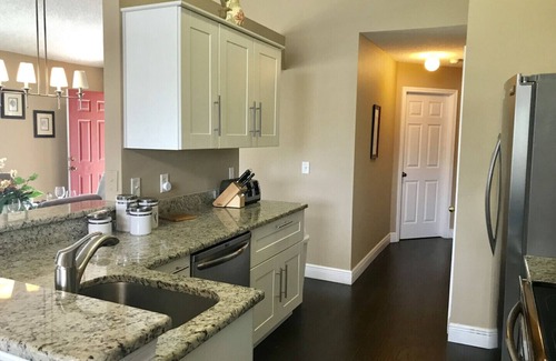 Westridge Villa | Large 4 bedrooms; Sleeps 8; 2 en-suite master bedrooms, 3 baths, Free Wifi/Cable/Parking