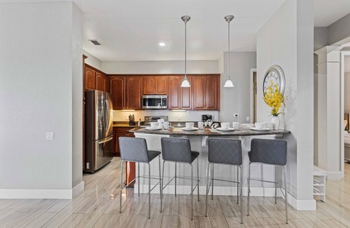 Florida Central Atlantic Coast Condo | Large 4 BR top floor condo, close to attractions!