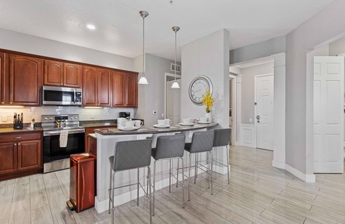 Florida Central Atlantic Coast Condo | Large 4 BR top floor condo, close to attractions!