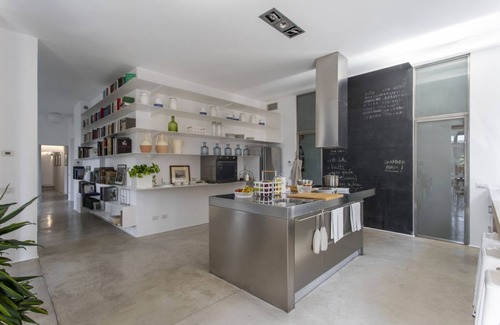Esquilino Apartment | Large and bright 200sqm apartment, able to accommodate up to 7 people, located on the 3rd floor with elevator (not suitable for disabled people) of a building dating back to the 19th century. The property overlooks Piazza Fanti's garden and is located in