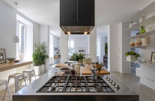 Esquilino Apartment | Large and bright 200sqm apartment, able to accommodate up to 7 people, located on the 3rd floor with elevator (not suitable for disabled people) of a building dating back to the 19th century. The property overlooks Piazza Fanti's garden and is located in