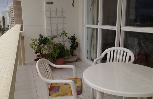 Pitangueiras Apartment | Large and bright apartment. Accommodates families. In front of the beach