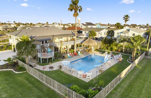 Jamaica Beach House | Large Bay Home- Big Swimming Pool Palapa Bar Surrounded by water & lush gardens