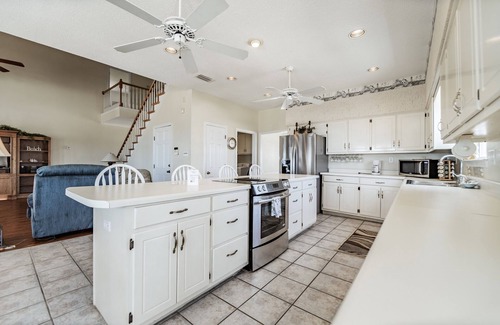 Dauphin Island House | Large Bayfront Home on sandy Bay beach with large screened porch.