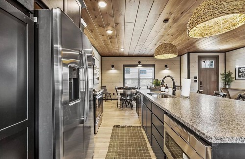 Sevierville Cabin | Large cabin a few miles from top attractions with Pool, Movie Theater, & Arcades