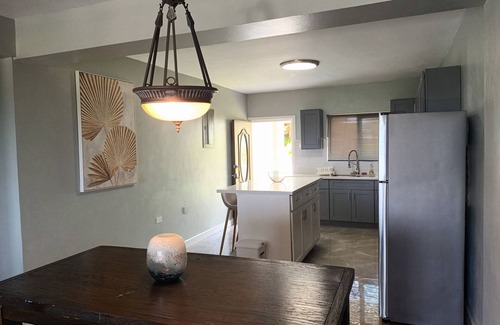 IronShore Estates Apartment | Large Family 2 bedroom 2 bathroom apartment in Ironshore. Kitchen. Pool, lounge