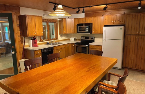 Cedar Run Cabin | Large family mountain retreat on Buck Run with a stocked pond in Leetonia Pa.