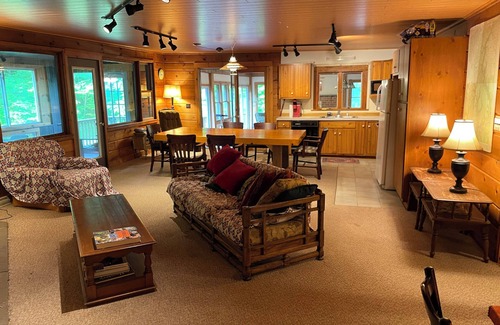 Cedar Run Cabin | Large family mountain retreat on Buck Run with a stocked pond in Leetonia Pa.