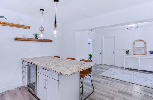 Seminole House | Large heated pool home with backyard oasis, dog friendly, AC and Wifi