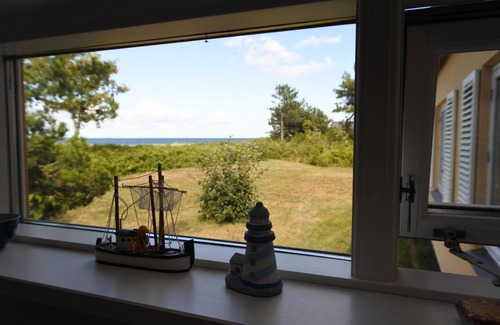 Marup House | Large holiday home with sea views - only approx. 60-meters from the sea.