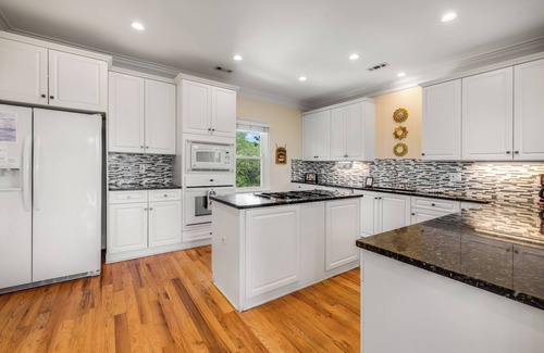 Isle of Palms House | Large Home Right by the Beach! Private Pool & Elevator! Fun Backyard w/Swingset