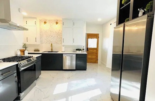 Southeast Omaha House | Large home w/backyard & Hot tub near downtown, zoo