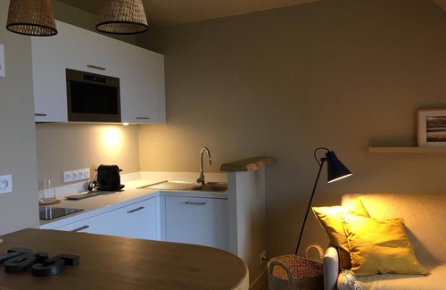 Saint-Guenole Apartment | large new studio sea view full south center bourg