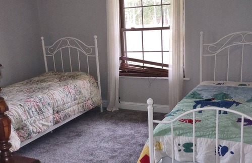 Linden Other | Large, open format farmhouse set back with 100 acres of prime hunting/fishing.
