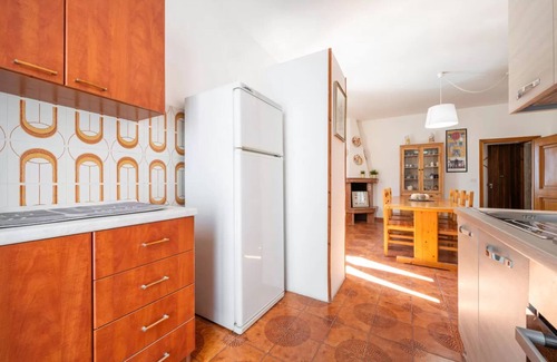 Lu Bagnu Apartment | Large seaside apartment with patio in Lu Bagnu