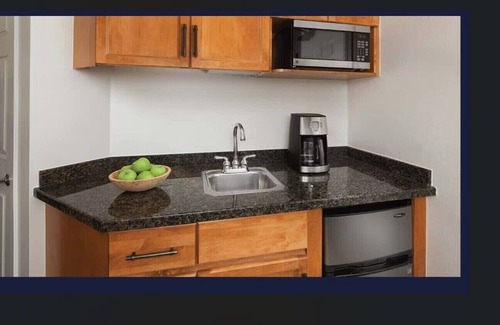 Palm Desert Apartment | Large studio sleeps 4, 1 king bed, sofa bed, kitchenette, dining, living, patio