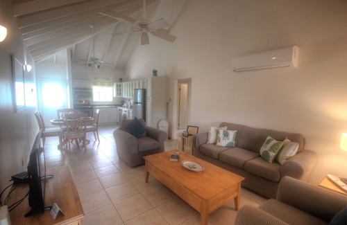 Jolly Harbour Apartment | Large Swimming Pool, Garden and Sea Views