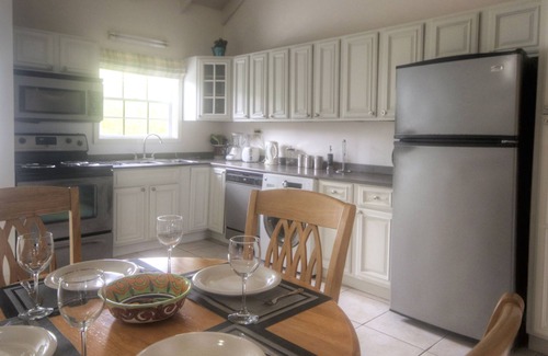Jolly Harbour Apartment | Large Swimming Pool, Garden and Sea Views