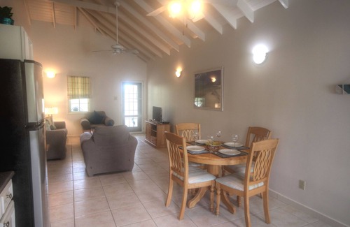 Jolly Harbour Apartment | Large Swimming Pool, Garden and Sea Views