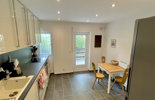 Lenggries Condo | Large vacation apartment with sauna, terrace, garden and open fireplace