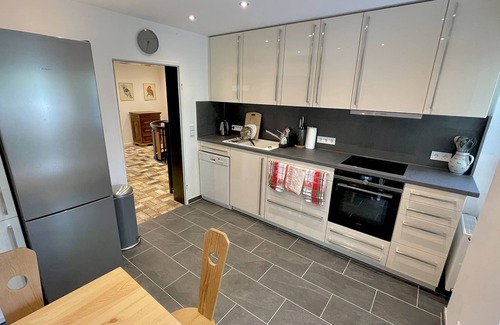 Lenggries Condo | Large vacation apartment with sauna, terrace, garden and open fireplace